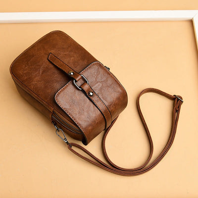 Bolso bandolera para mujer de piel sintética con bolsillo frontal estilo compacto - Daniela