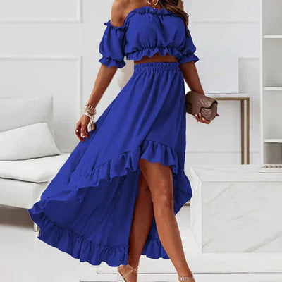 Elegante falda y top con volantes y hombros descubiertos, perfecta para un look femenino y sofisticado ideal para ocasiones especiales