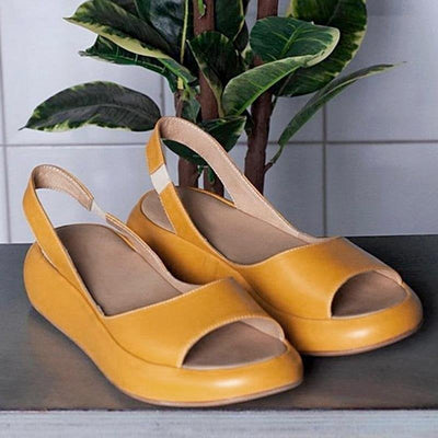 Elegantes sandalias de mujer con plataforma abierta