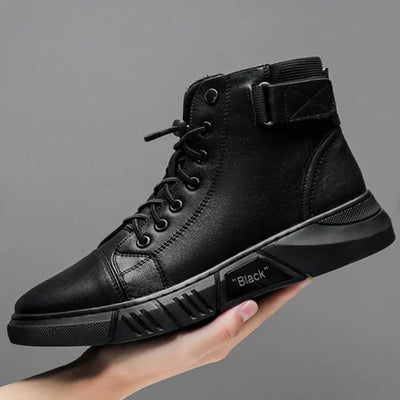 Elegantes botas de piel para hombre en negro