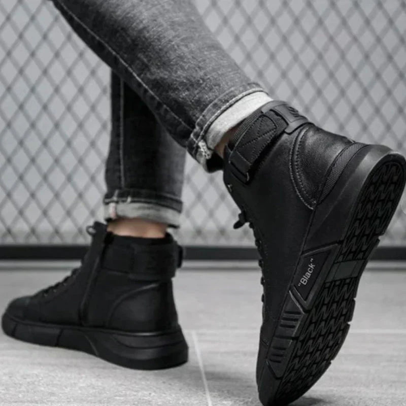 Elegantes botas de piel para hombre en negro