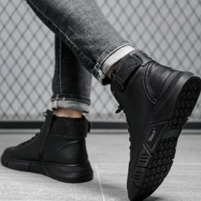 Elegantes botas de piel para hombre en negro