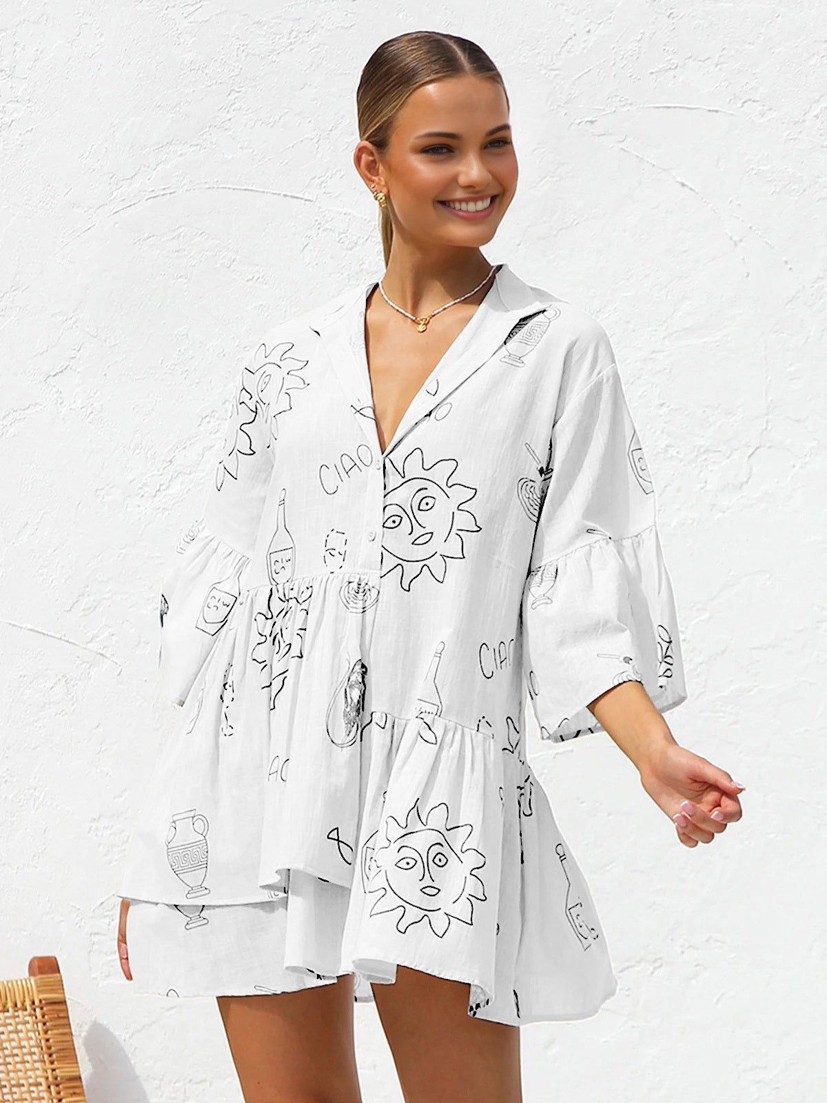 Millie - Vestido corto oversize con estampado solar