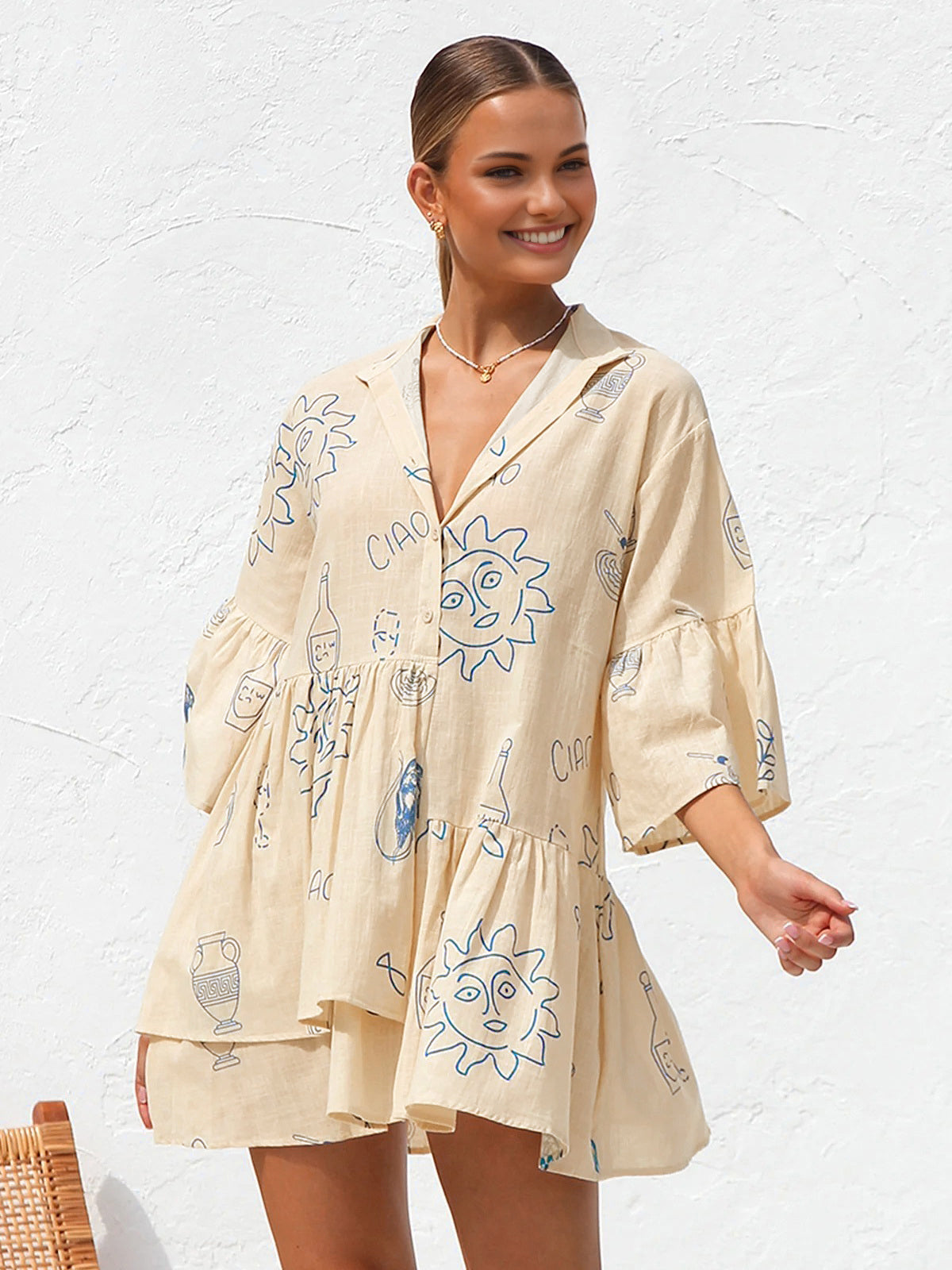 Millie - Vestido corto oversize con estampado solar