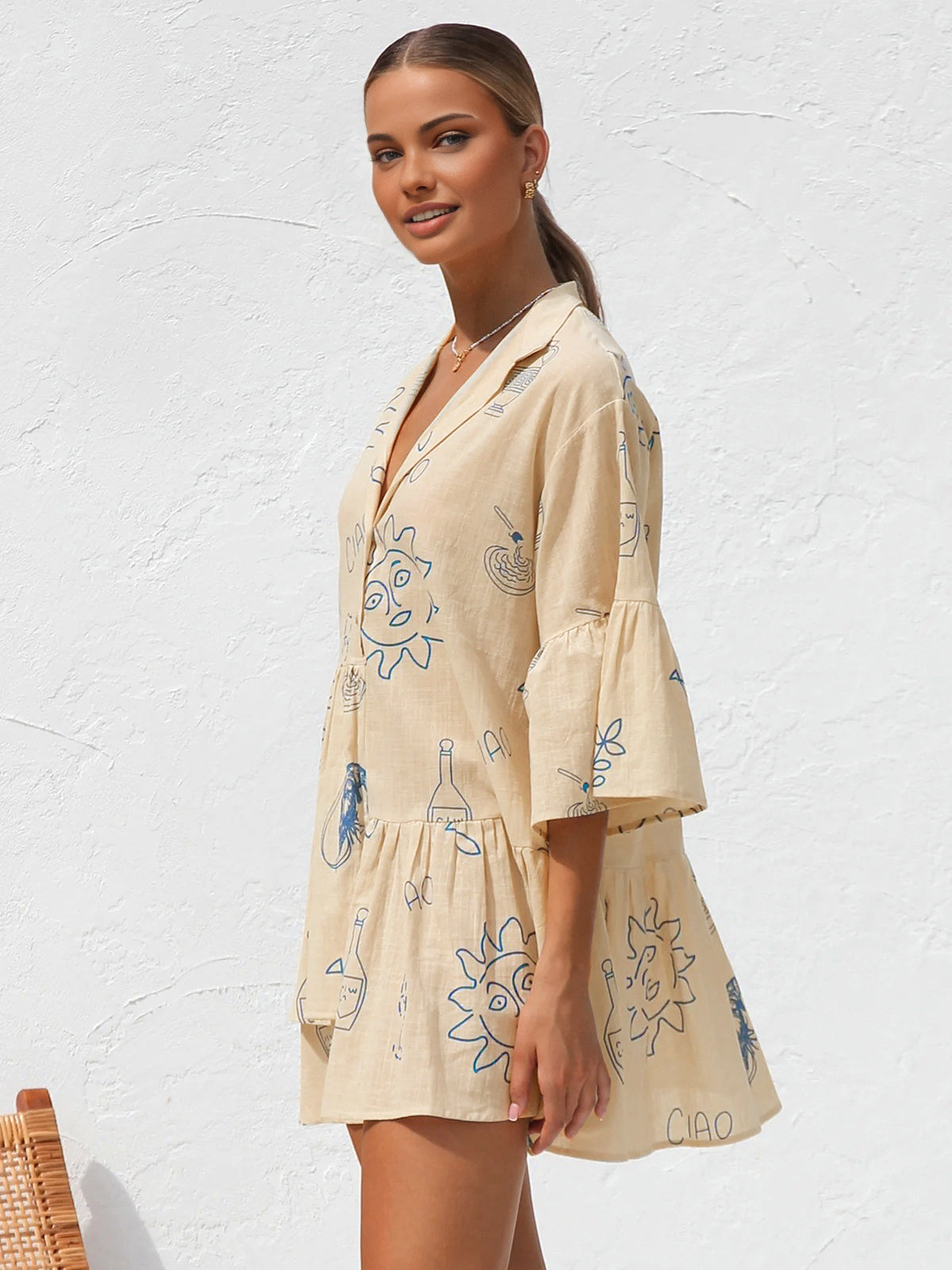Millie - Vestido corto oversize con estampado solar