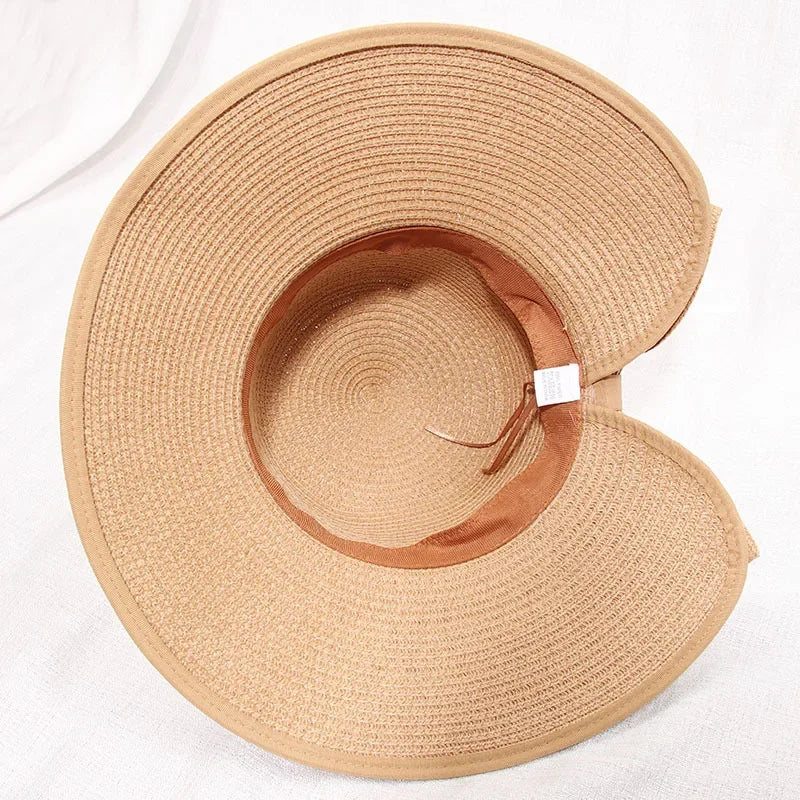 Sombrero de paja plegable de ala ancha y flexible