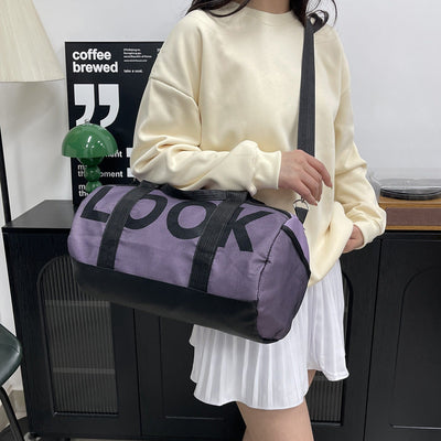 Bolso deportivo para mujer con compartimento independiente y diseño cilíndrico - Lía