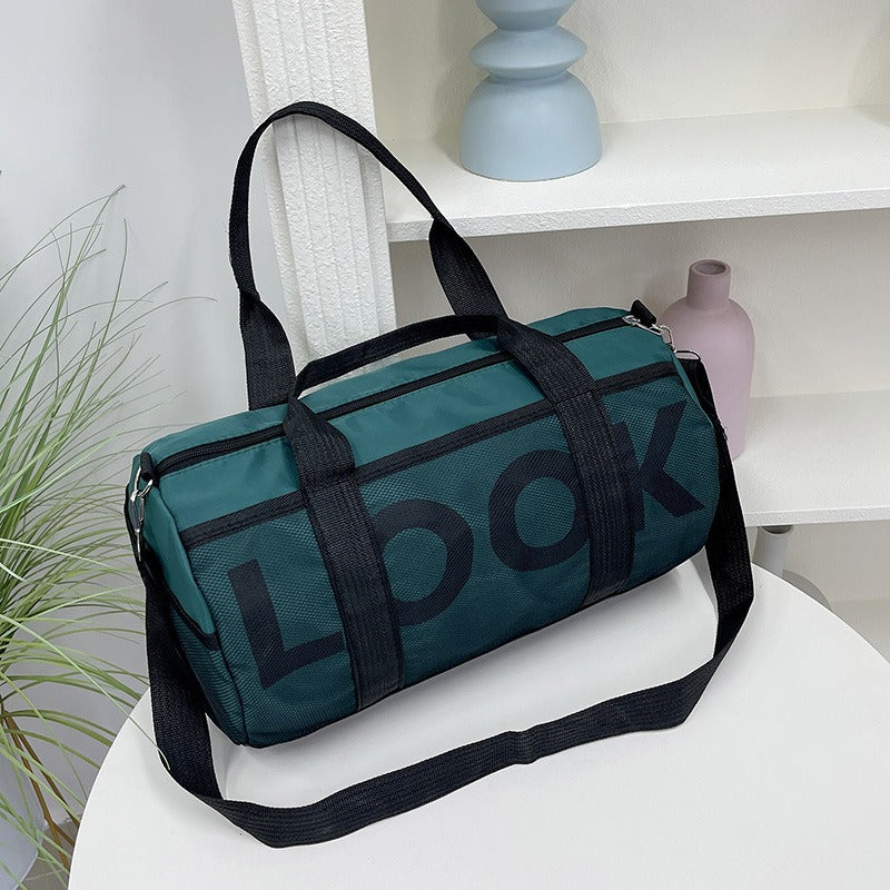 Bolso deportivo para mujer con compartimento independiente y diseño cilíndrico - Lía