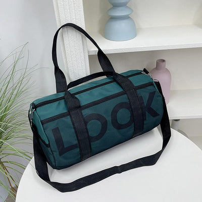 Bolso deportivo para mujer con compartimento independiente y diseño cilíndrico - Lía