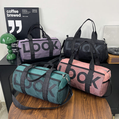 Bolso deportivo para mujer con compartimento independiente y diseño cilíndrico - Lía