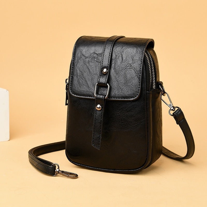 Bolso bandolera para mujer de piel sintética con bolsillo frontal estilo compacto - Daniela