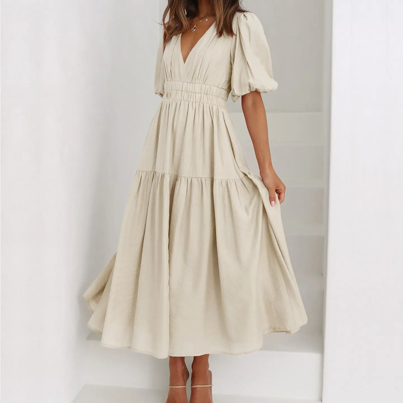 Kelly - Vestido estilo elegante con escote en V y mangas abullonadas