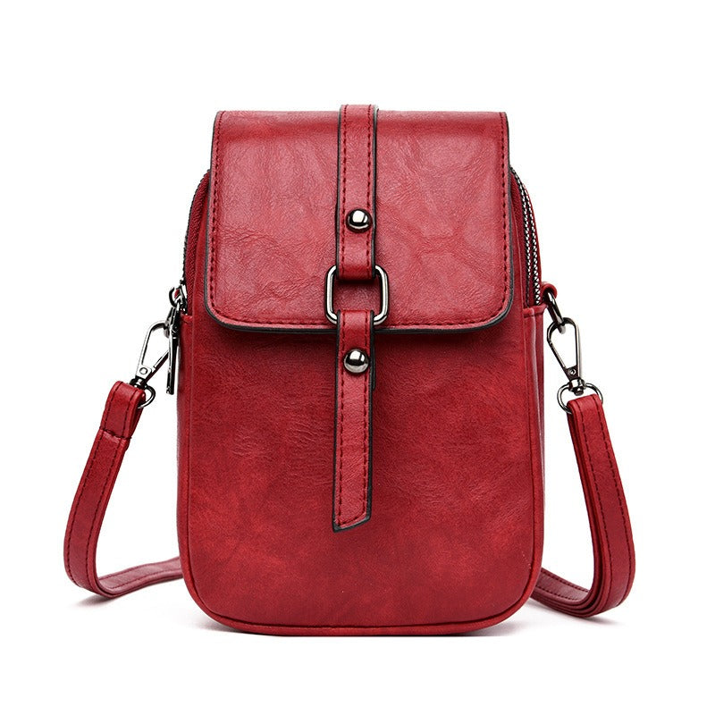Bolso bandolera para mujer de piel sintética con bolsillo frontal estilo compacto - Daniela