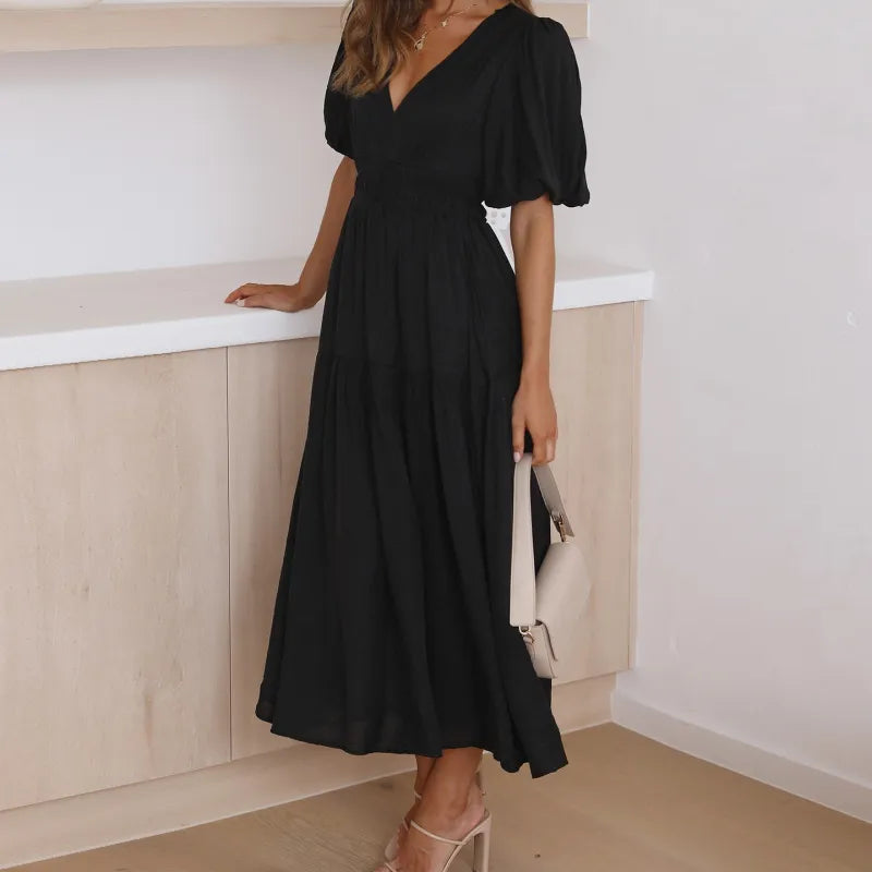 Kelly - Vestido estilo elegante con escote en V y mangas abullonadas
