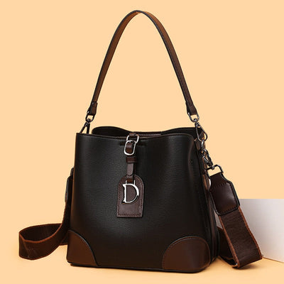 Bolso bandolera para mujer de piel sintética con diseño bicolor estilo bucket - Daniela