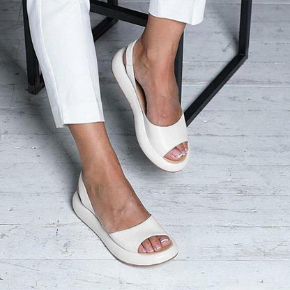 Elegantes sandalias de mujer con plataforma abierta