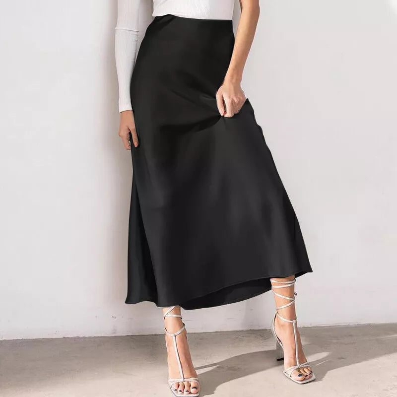 Elegante y femenina falda de satén de talle alto y línea A, ideal para un look refinado y sofisticado