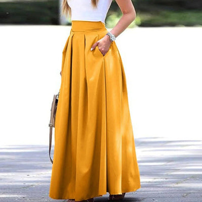 Elegante y fluida falda plisada de talle alto, ideal para un look sofisticado y femenino